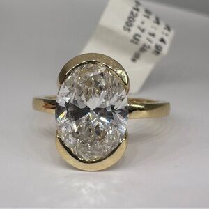 3.04 carat e vs1 oval lab diamond half bezel solitaire engagement ring